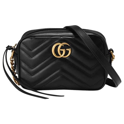 black gucci backpack with gold chain|Gucci marmont mini chain bag.